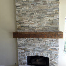 rustic-rough-hewn-fireplace-mantel-installation